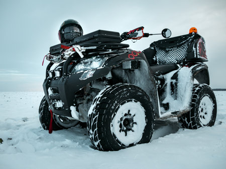 Off-road vehicle ATV 4x4 in the snow.の写真素材