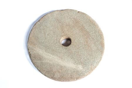 circle whetstone has been used on white backgroundの写真素材