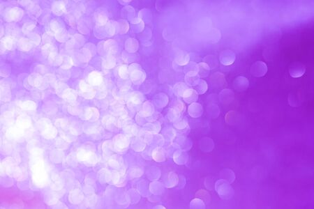 Abstract bokeh background in purpleの写真素材