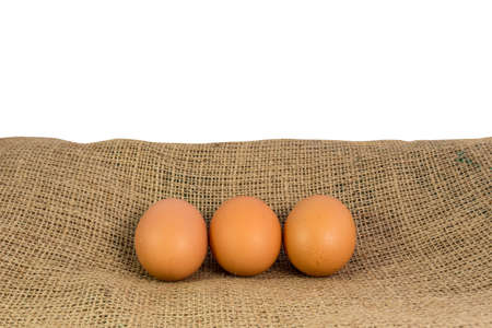 egg placed on sackclothの写真素材