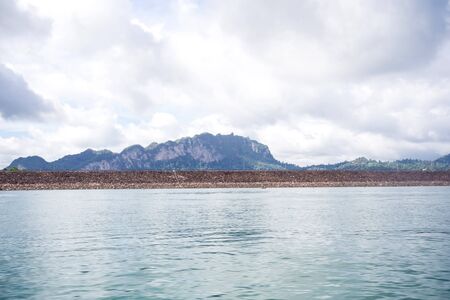 environment of mountains and river natural attractions in Ratchaprapha Dam at Khao Sok National Park, Surat Thani Province, Thailand.の写真素材