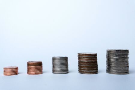 Thai coins are stacked in layers arranged from small to large.