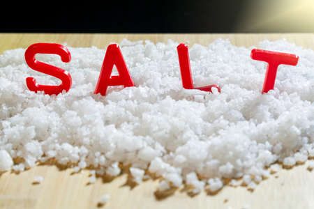 heap of sea salt and SALT alphabetsの写真素材
