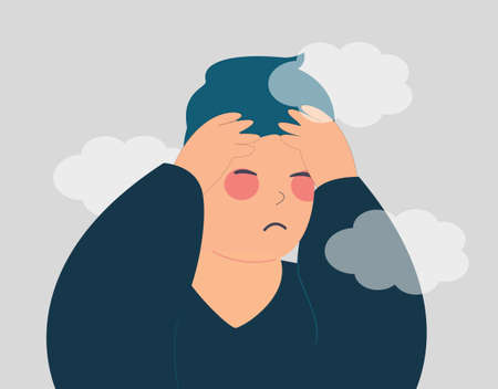 Depressed Young man with a clouded mind feels sad. Stressed teenager male suffers from Alzheimer or temporary memory loss. Mental health disorders, anxiety, depression concept. Vector illustration.のイラスト素材