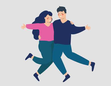 Happy couple hug or embrace each other with love and care. Young woman and man jumping and dancing...