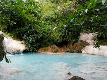 Clear blue waterfall pool 