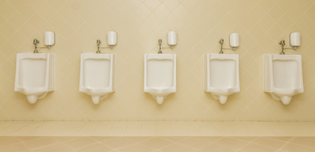 urinal man five clean toilets in public toilets,  no other objects.の写真素材