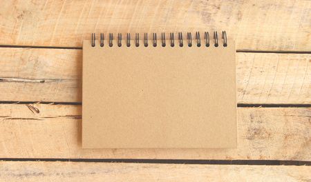 Notebook on wooden table