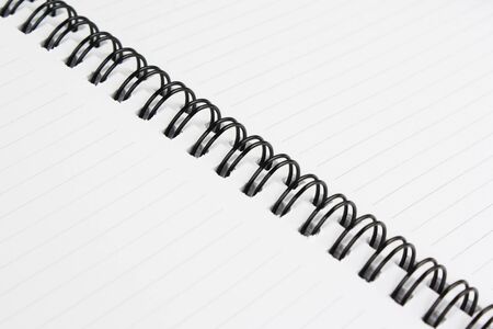 blank notebook on white paperの写真素材