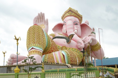 big pink Ganesha in relax pose, thailand の写真素材