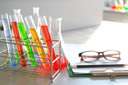 the laboratory test tubes with colorful liquid
