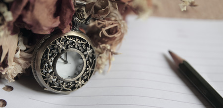 Vintage pocket watch with dry roose
