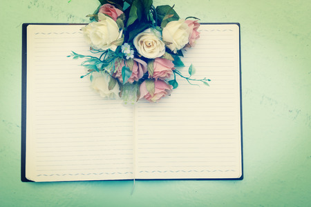 blank of book and flower with vintage filter