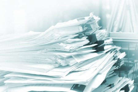 Stack of documents on the table with soft focus