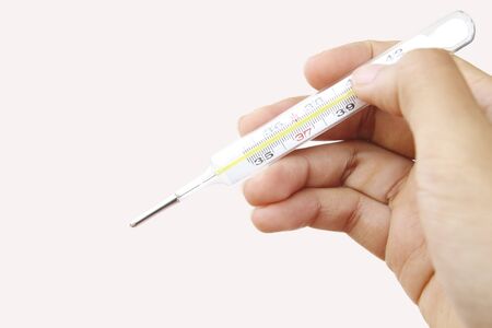 doctor hand hold thermometer
