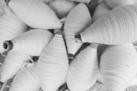 Multicolored bobbins of sewing cotton threads          の写真素材