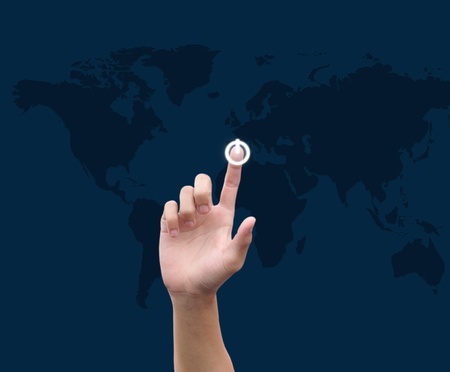 hand pushing a button on a touch screen interface の写真素材