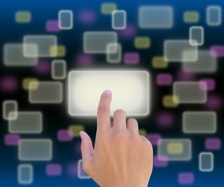 hand pushing a button on a touch screen interfaceの写真素材