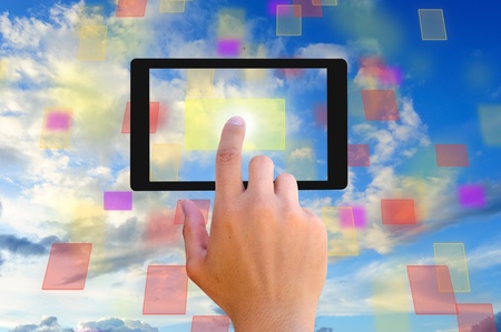 hand pushing a button on a touch screen interface の写真素材
