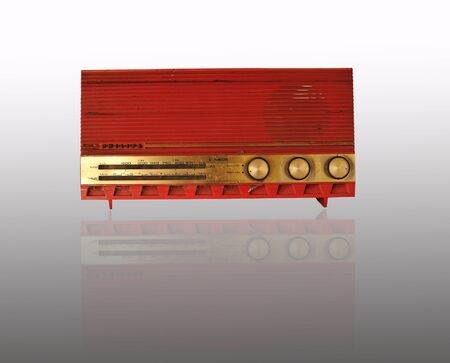 Vintage radio isolated on whiteの写真素材