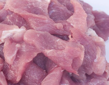 Raw pork isolated on whiteの写真素材