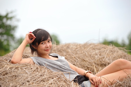 Portrait of beautiful girl in field の写真素材