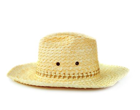 yellow wicker straw hat isolated on white backgroundの写真素材