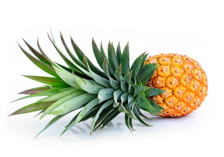 ripe pineapple isolated on white の写真素材