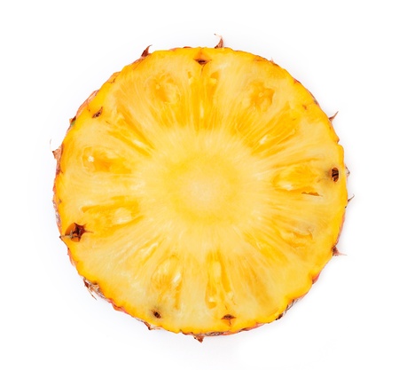 Pineapple slice isolated over white background. の写真素材