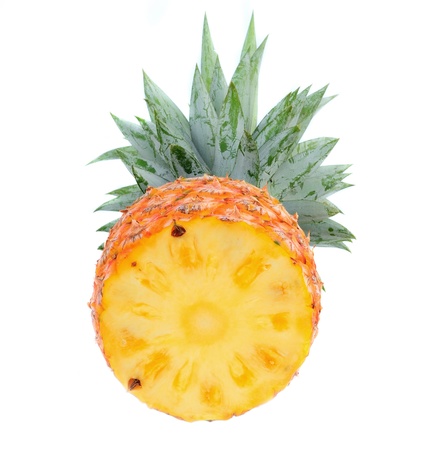 ripe pineapple isolated on white の写真素材