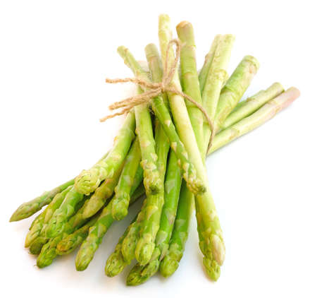 Bunch of fresh asparagus isolated on white background の写真素材