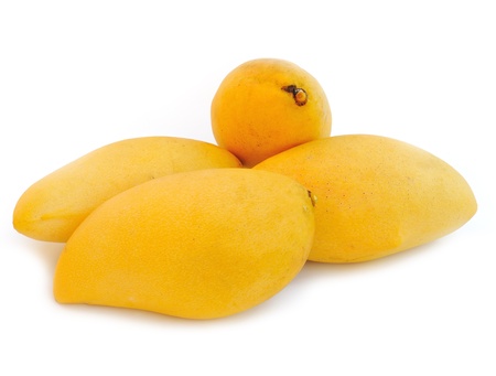 Yellow mango isolated on a white background の写真素材