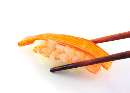 Sushi with chopsticks on white background の写真素材