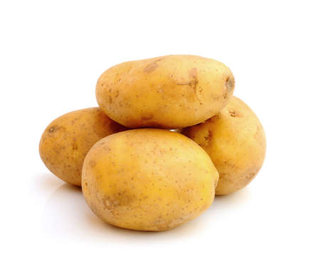 bunch of potatoes on white backgroundの写真素材