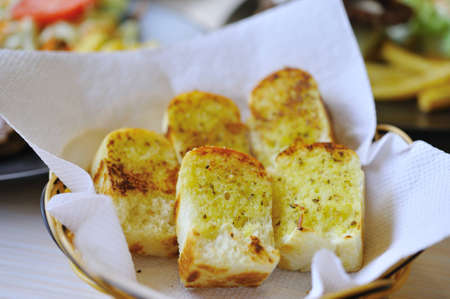 Garlic bread with herbsの写真素材
