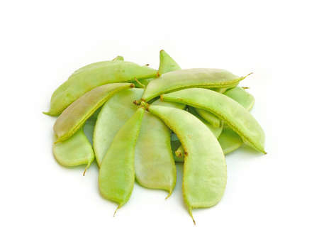 Pods of green peas sweet on a white background 