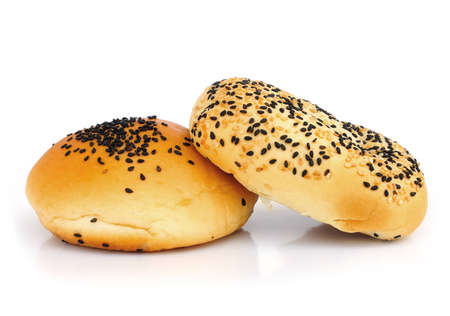 bun with sesame seeds isolated on white background の写真素材
