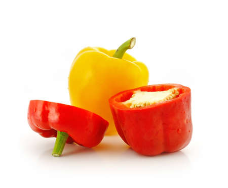Red and yellow sweet pepper isolated on white background の写真素材