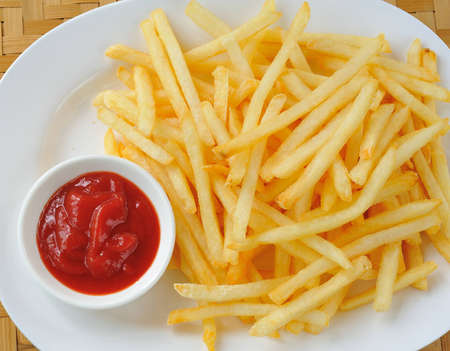 French fries in a white plateの写真素材