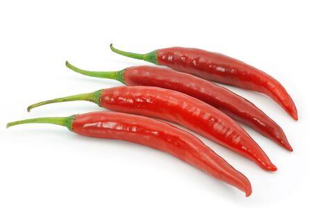 red hot chili pepper isolated on a white background の写真素材