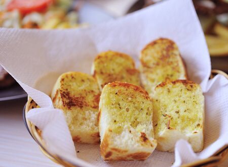 Garlic bread with herbsの写真素材