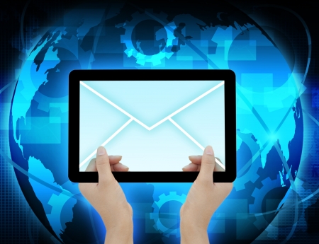 Hands with world mail delivery on world map backgroundの写真素材