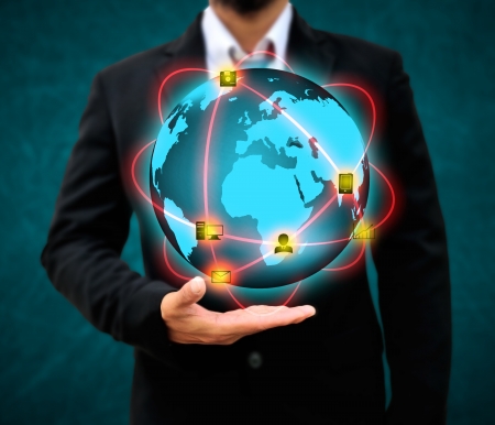 Businessman holding world  Technology conceptの写真素材