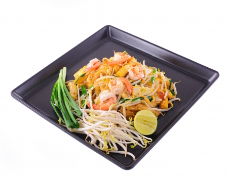 Thai food Pad thai , Stir fry noodles with shrimp on black plateの写真素材