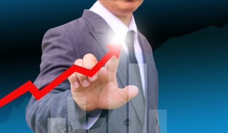 Graphs on the hands of businessmen.の写真素材