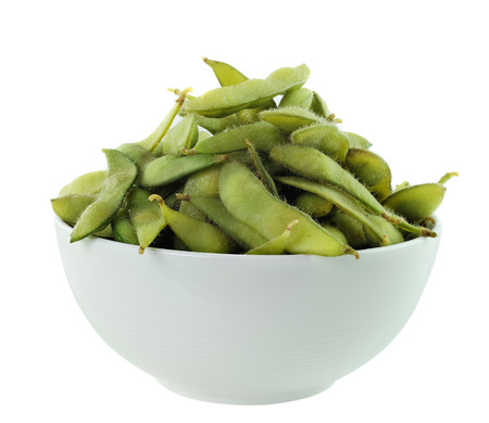 green beans in the bowl on white backgroundの写真素材