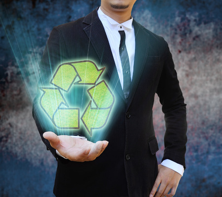 businessman holding Recycle signの写真素材