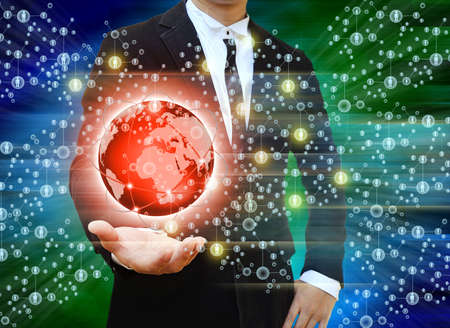 Businessman holding world Social Networkの写真素材