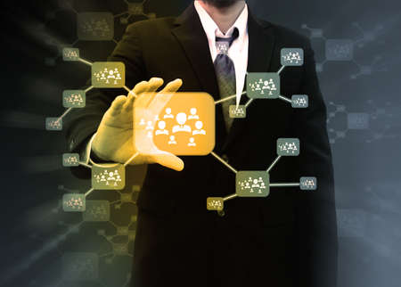 Businessman holding icon of social network
