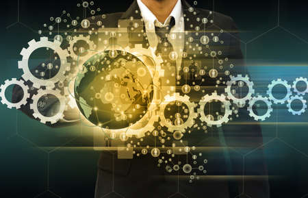 Business people holding social network with globeの写真素材